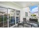 Covered patio with seating featuring views of the community at 4868 Dahlia Ct. # 202, Myrtle Beach, SC 29577