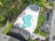 Aerial view of the pool and gazebo surrounded by trees at 500 Fairway Village Dr. # J-7, Myrtle Beach, SC 29588
