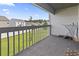 View from the balcony of a well-maintained lawn and neighboring houses at 500 Fairway Village Dr. # J-7, Myrtle Beach, SC 29588