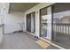 A spacious balcony featuring sliding glass doors and outdoor decor at 500 Fairway Village Dr. # J-7, Myrtle Beach, SC 29588