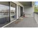 View of a cozy carpeted balcony with sliding glass doors at 500 Fairway Village Dr. # J-7, Myrtle Beach, SC 29588