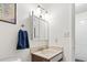 Bathroom with a large mirror, vanity, and a towel rack with a blue towel at 500 Fairway Village Dr. # J-7, Myrtle Beach, SC 29588