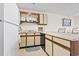 Bright kitchen with white appliances and lots of storage at 500 Fairway Village Dr. # J-7, Myrtle Beach, SC 29588