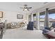 Comfortable living room with access to a balcony offering neighborhood views at 500 Fairway Village Dr. # J-7, Myrtle Beach, SC 29588