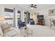 Bright living room showcasing a balcony with neighborhood views and comfortable seating at 500 Fairway Village Dr. # J-7, Myrtle Beach, SC 29588