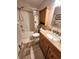 Bathroom featuring a vanity with granite countertop, and a shower with a tub at 503 20Th Ave. N # 3B, North Myrtle Beach, SC 29582