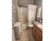 Bathroom featuring a vanity with granite countertop, and a shower with a tub at 503 20Th Ave. N # 3B, North Myrtle Beach, SC 29582
