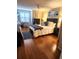 Cozy bedroom with light walls, wood floors, and beach themed decor and artwork at 503 20Th Ave. N # 3B, North Myrtle Beach, SC 29582