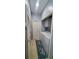 A convenient laundry room with a washer, dryer, and storage space at 503 20Th Ave. N # 3B, North Myrtle Beach, SC 29582
