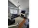 An inviting living room featuring high ceilings, a fireplace, and comfortable seating at 503 20Th Ave. N # 3B, North Myrtle Beach, SC 29582