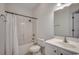 Bathroom featuring a shower-tub combination, white vanity and toilet at 5046 Belleglen Court # 202, Myrtle Beach, SC 29579