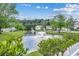 Community pond view with fountains and landscaping at 5046 Belleglen Court # 202, Myrtle Beach, SC 29579