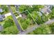 Aerial view of a wooded property with lush landscaping at 520 13Th Ave. N, Surfside Beach, SC 29575