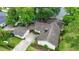 Aerial view of a home with lush landscaping and a detached garage at 520 13Th Ave. N, Surfside Beach, SC 29575