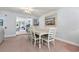 Bright dining area featuring seating for six, and a view to the living room at 520 13Th Ave. N, Surfside Beach, SC 29575