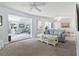 Open-concept living area showcasing a living room, dining space, and natural light at 520 13Th Ave. N, Surfside Beach, SC 29575