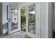 View of a private outdoor patio from the bright, airy living space at 520 13Th Ave. N, Surfside Beach, SC 29575