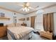 Inviting bedroom featuring soft lighting and large window at 556 Crusade Circle, Conway, SC 29526