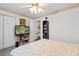 Comfortable bedroom featuring a TV, closet, and soft lighting at 556 Crusade Circle, Conway, SC 29526
