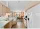 Spacious kitchen featuring tile flooring, and a dining area with natural light at 556 Crusade Circle, Conway, SC 29526