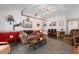Inviting living room with a plush sofa, ceiling fan, and ample space at 556 Crusade Circle, Conway, SC 29526