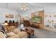 Cozy living room featuring neutral tones, comfortable seating, and an open floor plan at 556 Crusade Circle, Conway, SC 29526