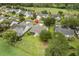Aerial view of a home nestled among lush greenery, showcasing its serene neighborhood setting at 583 Wildflower Trail, Myrtle Beach, SC 29579