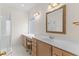 Bright bathroom with vanity, framed mirror and shower stall with a glass door at 583 Wildflower Trail, Myrtle Beach, SC 29579