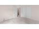 This is a neutral bedroom with carpet, closet, open door, and light walls at 583 Wildflower Trail, Myrtle Beach, SC 29579