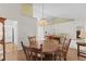Dining area with classic wood furniture and plenty of natural light at 583 Wildflower Trail, Myrtle Beach, SC 29579