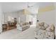 Open-concept living area featuring high ceilings, neutral tones, and hardwood flooring at 583 Wildflower Trail, Myrtle Beach, SC 29579