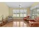 Cozy sun room with lots of windows and natural light at 583 Wildflower Trail, Myrtle Beach, SC 29579