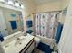 Bathroom featuring coordinated coastal themed shower curtain and blue towels at 6001-B5 S Kings Hwy., Myrtle Beach, SC 29575