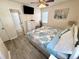 This bedroom has a decorative nautical theme and television at 6001-B5 S Kings Hwy., Myrtle Beach, SC 29575
