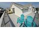 Deck with blue chairs and view of the roof at 6001-B5 S Kings Hwy., Myrtle Beach, SC 29575