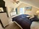 This cozy main bedroom has a king size bed, dressers, and a view of the balcony for seamless indoor/outdoor living at 6001-B5 S Kings Hwy., Myrtle Beach, SC 29575