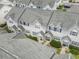 Aerial view showcasing the townhouse complex with well-maintained landscaping and ample parking at 611 2Nd Ave. S # 18-C, North Myrtle Beach, SC 29582
