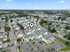 This aerial view showcases a dense residential community with ample parking and scenic surroundings at 611 2Nd Ave. S # 18-C, North Myrtle Beach, SC 29582