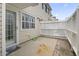 This backyard patio features a privacy fence and a door that allows direct home access at 611 2Nd Ave. S # 18-C, North Myrtle Beach, SC 29582