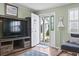 Inviting foyer with wood floors, open doorway, and decorative artwork at 611 2Nd Ave. S # 18-C, North Myrtle Beach, SC 29582