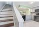 Bright, open kitchen features modern appliances and neutral tones at 611 2Nd Ave. S # 18-C, North Myrtle Beach, SC 29582