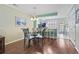 Bright kitchen and dining area with counter seating and stainless steel appliances at 611 2Nd Ave. S # 18-C, North Myrtle Beach, SC 29582