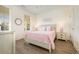Cozy guest bedroom featuring a double bed, rustic decor, and ample natural light, perfect for a welcoming stay at 611 N Ocean Blvd., Surfside Beach, SC 29575
