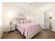 The guest bedroom with warm decor features a double bed, and access to an ensuite bathroom at 611 N Ocean Blvd., Surfside Beach, SC 29575