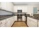 Modern kitchen featuring stainless steel appliances and ample counter space, ideal for cooking and meal preparation at 611 N Ocean Blvd., Surfside Beach, SC 29575