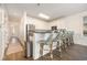 Well-lit kitchen with counter seating and stainless steel appliances, perfect for casual dining and entertaining at 611 N Ocean Blvd., Surfside Beach, SC 29575