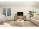 Inviting living room with stylish decor, a wooden cabinet, and a comfortable seating arrangement at 611 N Ocean Blvd., Surfside Beach, SC 29575