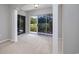 Bright bedroom with neutral carpeting and sliding glass doors overlooking the backyard at 612 Intracoastal Way Dr. # 103, Myrtle Beach, SC 29579