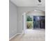 Bright bedroom with neutral carpeting and sliding glass doors overlooking the backyard at 612 Intracoastal Way Dr. # 103, Myrtle Beach, SC 29579