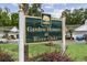 Sign for Garden Homes at River Oaks, a charming community surrounded by greenery at 612 Intracoastal Way Dr. # 103, Myrtle Beach, SC 29579